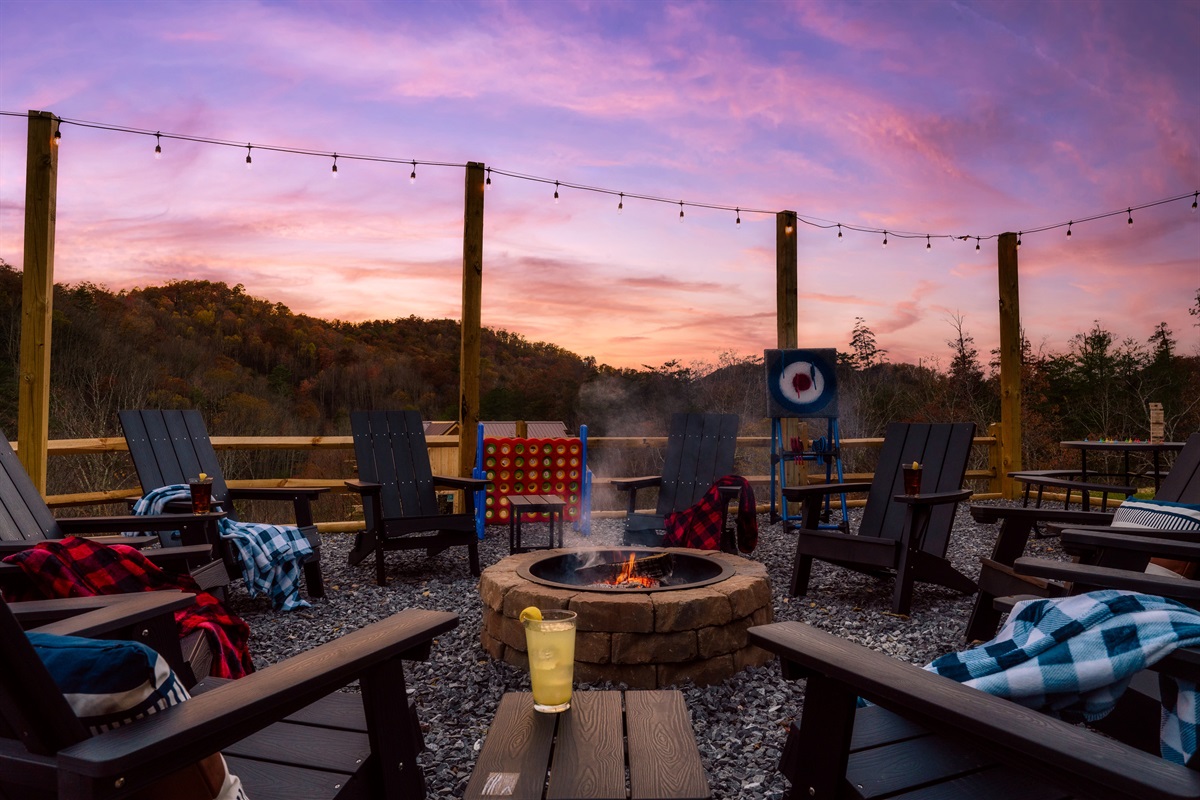 Fire Pit in backyard with picnic tables & views