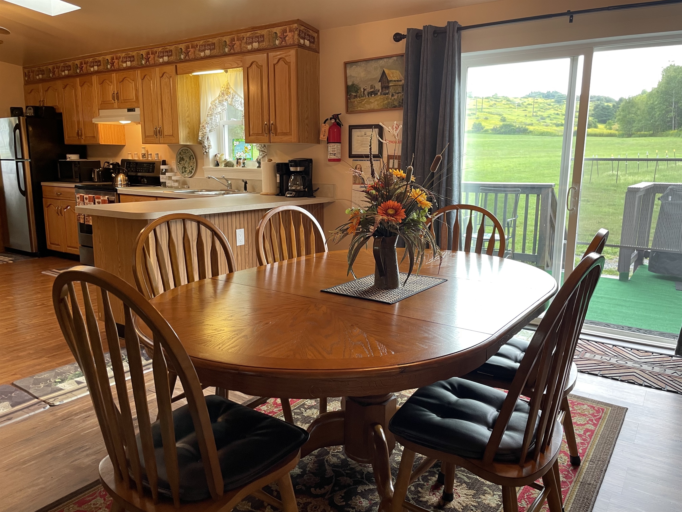 Dining area and sliders to rear deck