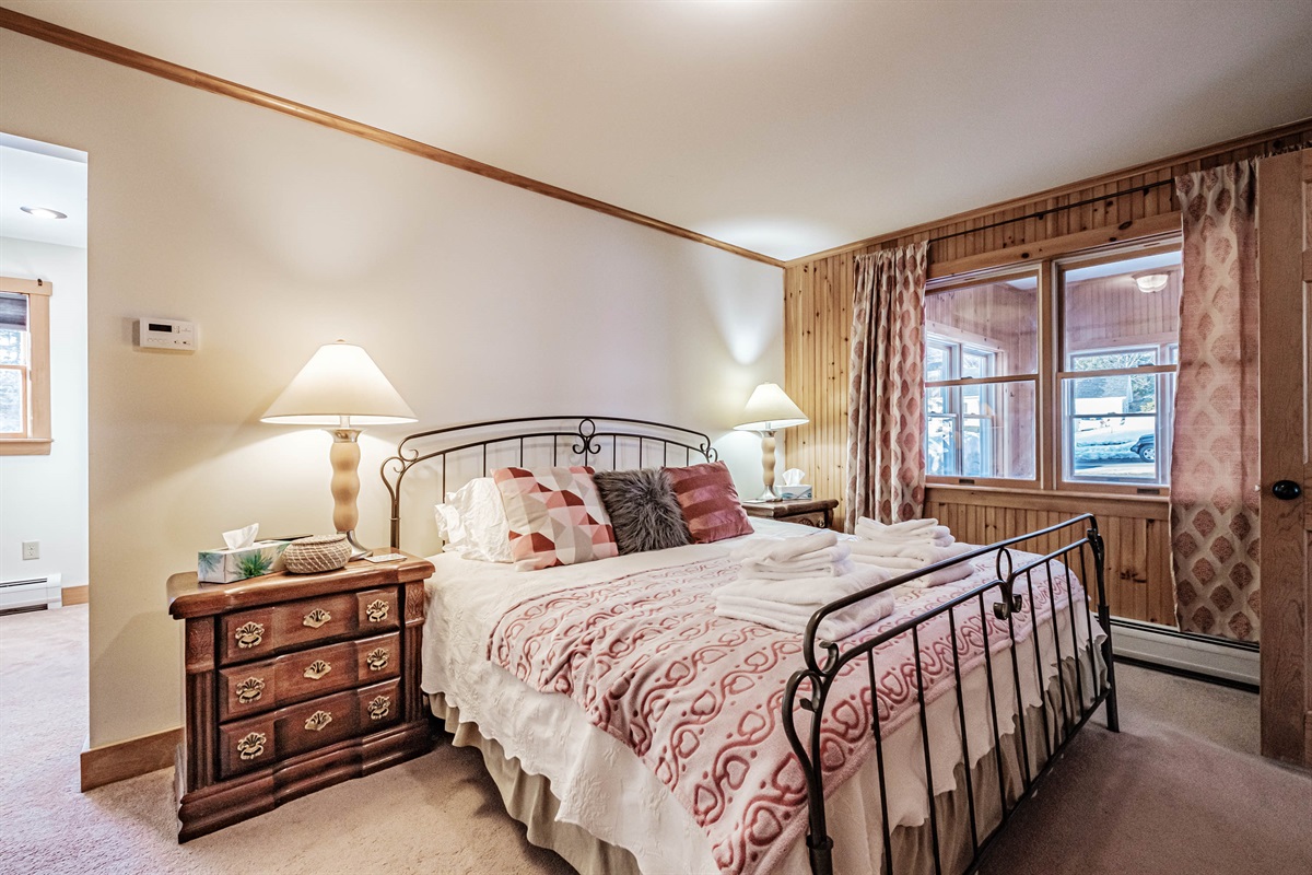 Master suite featuring a comfortable king bed.