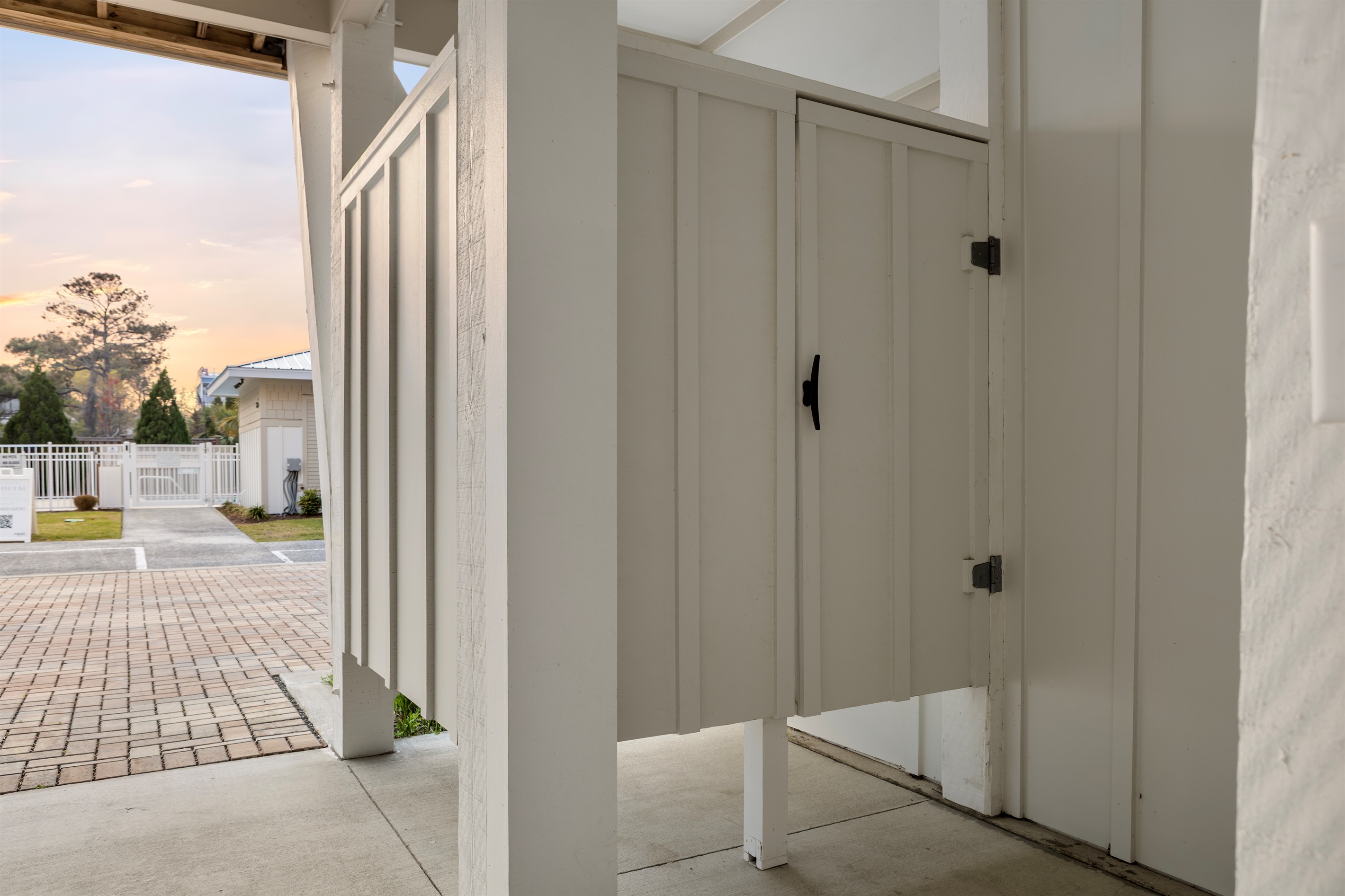Private outdoor shower in carport