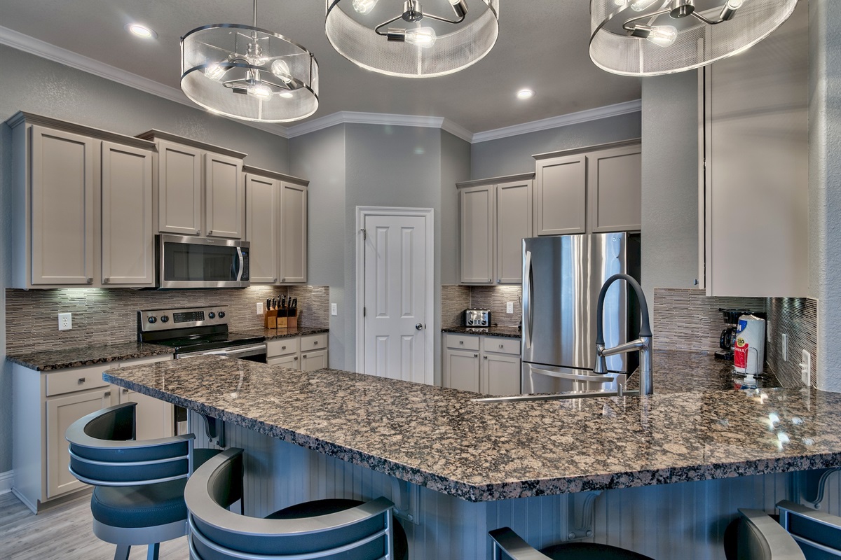 Gourmet eat-in kitchen with breakfast bar