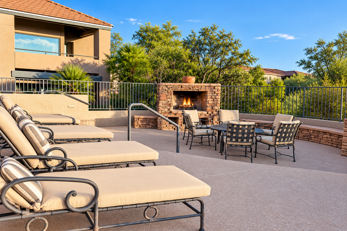 Gather around the outdoor fireplace for a cozy and inviting atmosphere. Enjoy the warmth of the fire while relaxing by the pool.
