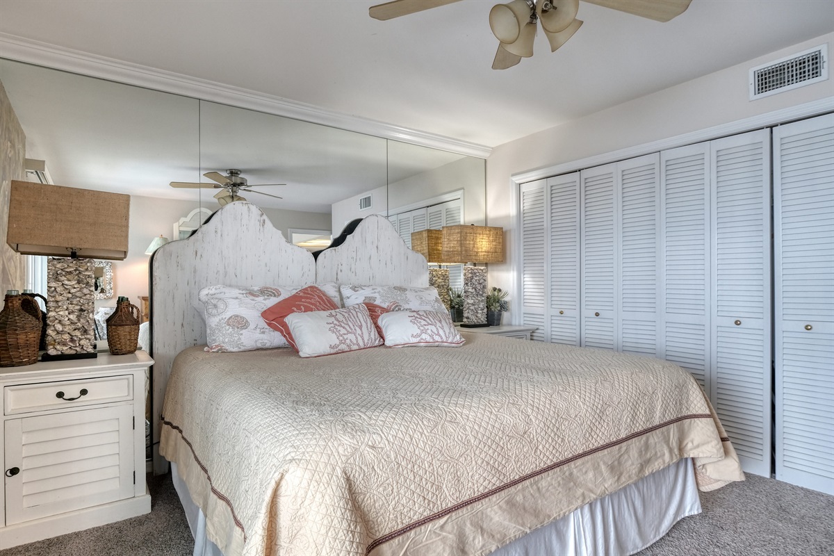 Master bedroom with a king bed