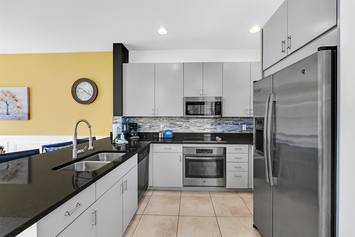 Stainless appliances and solid surface countertops