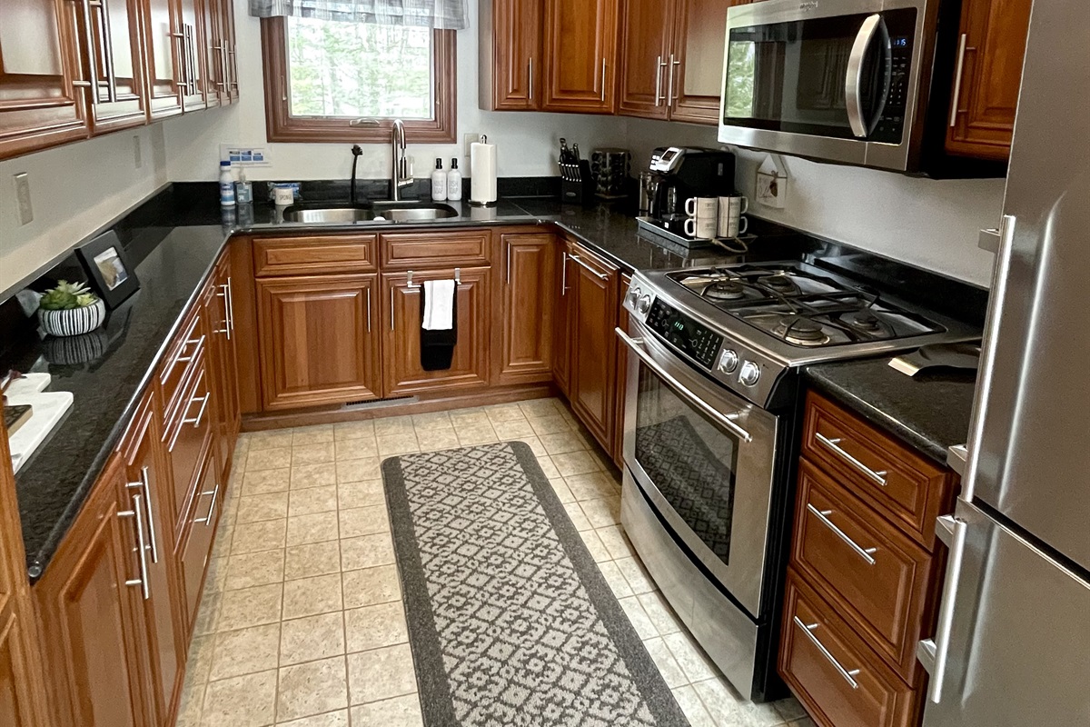 Full stocked with Large full kitchen granite countertops, stainless steel appliances, oven, dishwasher, toaster, electric skillet 