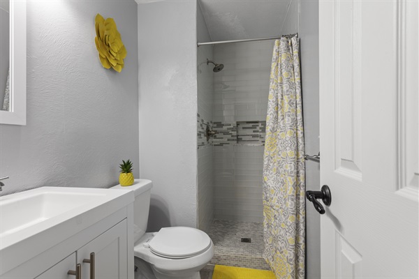 Rejuvenate in an ensuite bathroom, equipped with essentials to ensure a revitalizing end to your day of exploration.