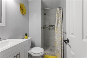 Rejuvenate in an ensuite bathroom, equipped with essentials to ensure a revitalizing end to your day of exploration.