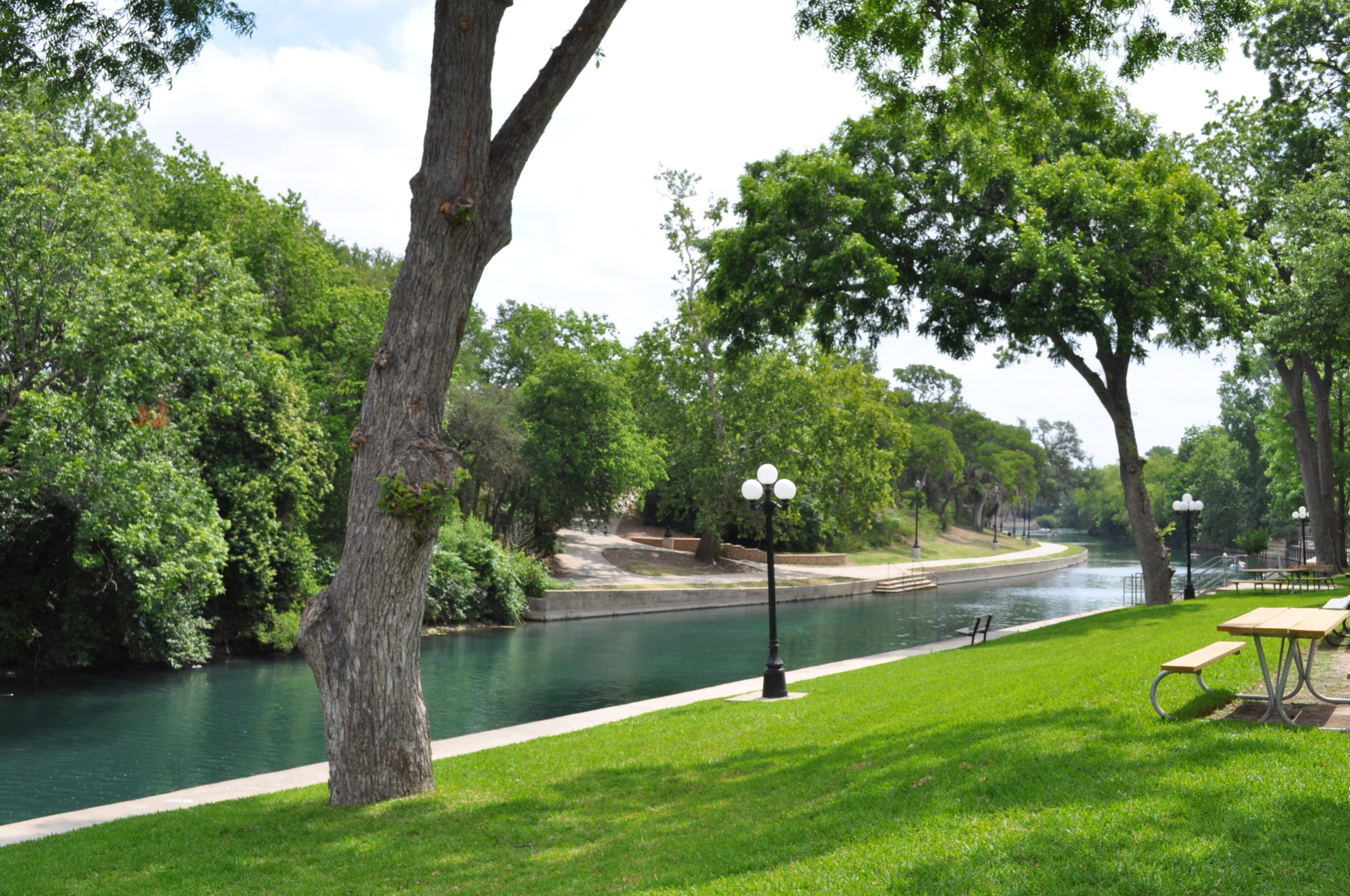 Long views of the Comal River from the grounds.  Yes, you can enter the river from the stairs at our bulkhead.