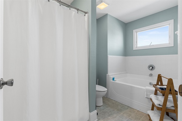 Primary bathroom has separate shower and  tub