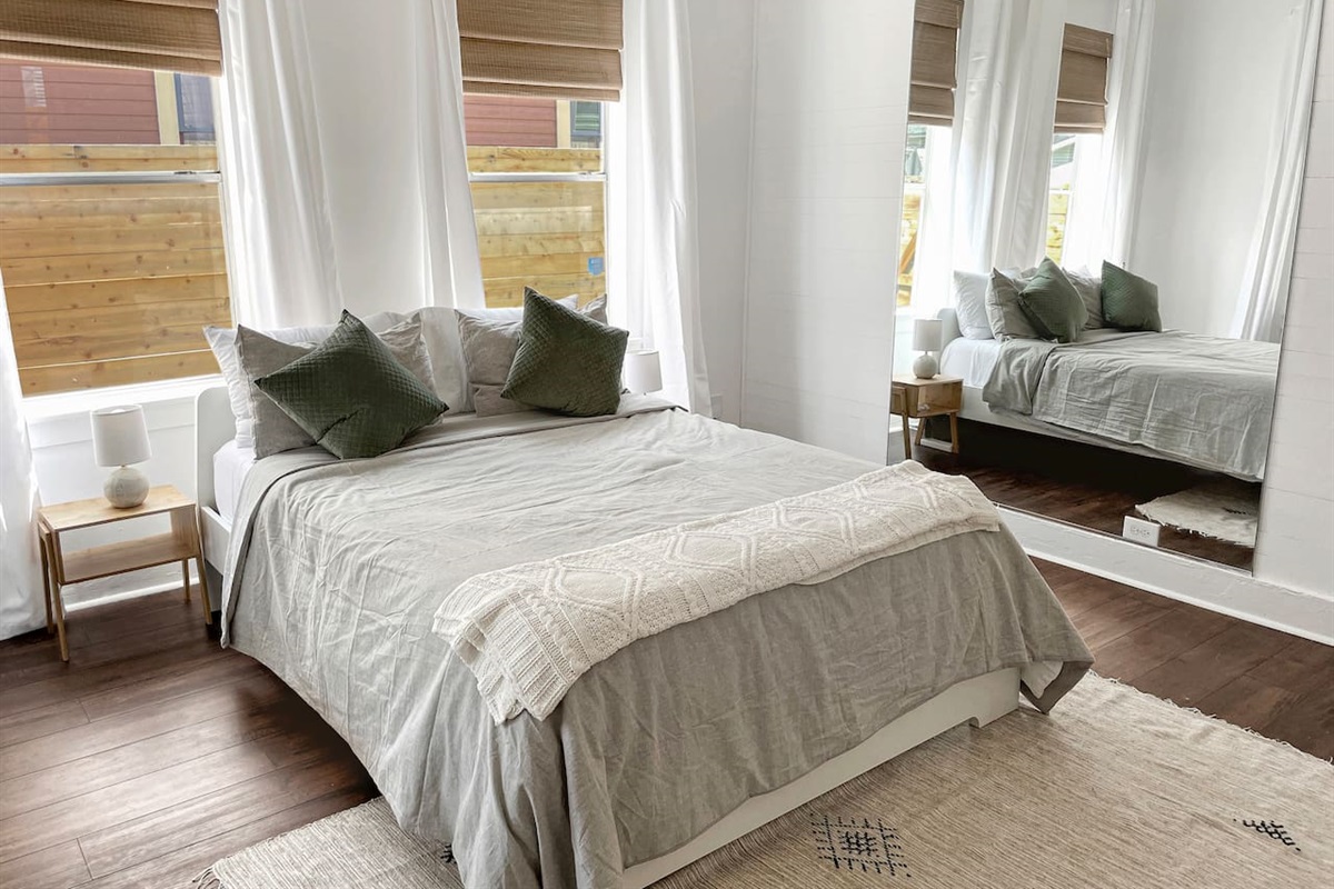 Enjoy our front bedroom and admire how good you look in our super-sized mirror!