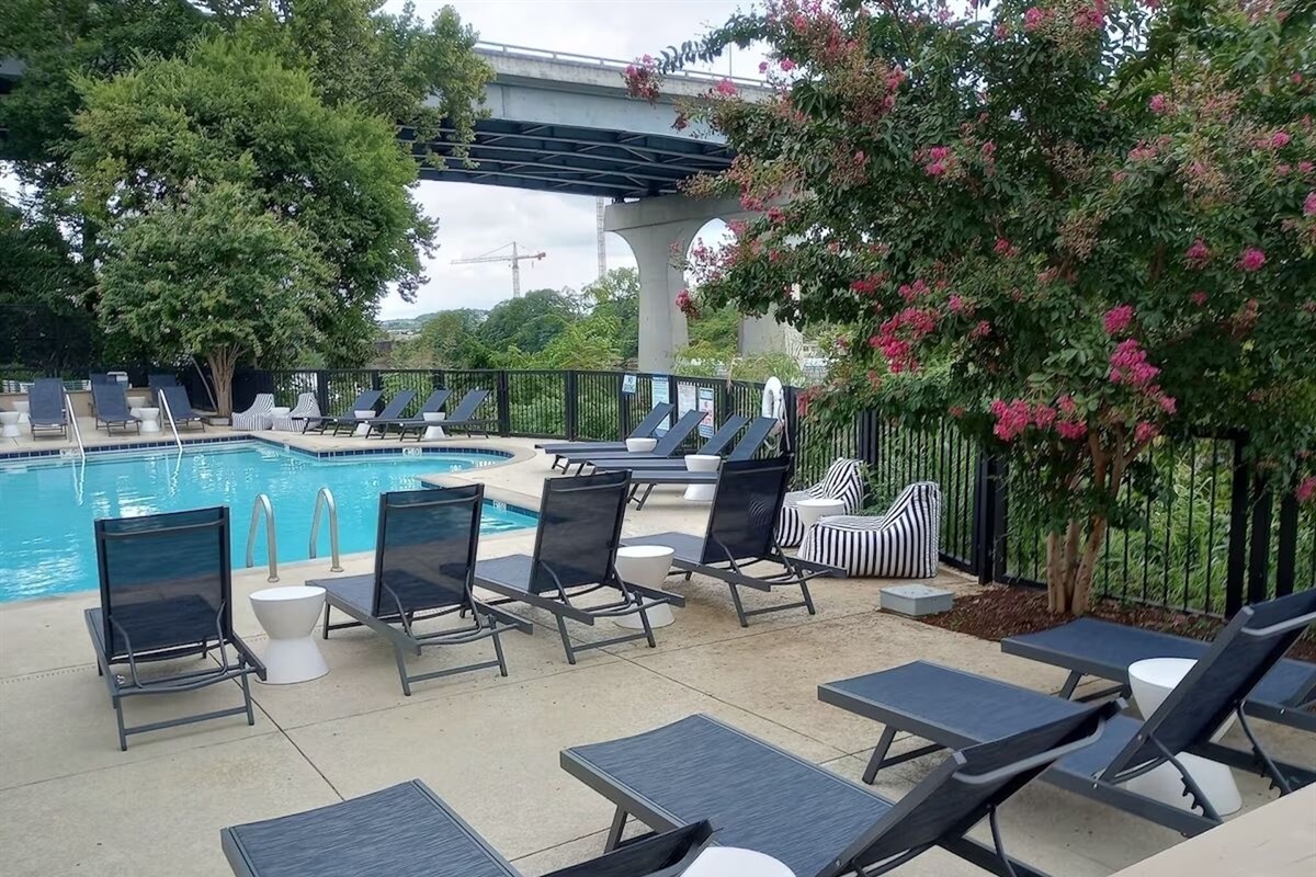 Relax as you lounge by the community pool