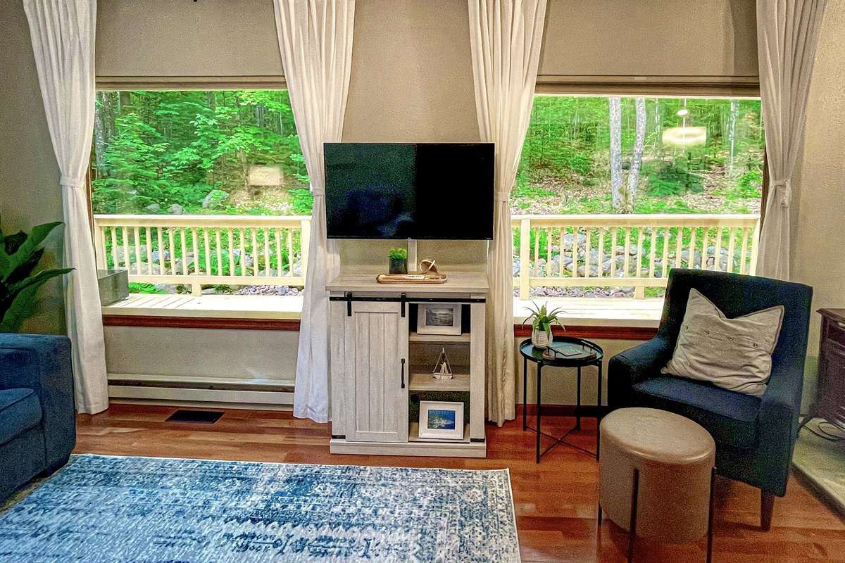 Two huge panoramic mirror reflective double windows view out of living room. You can see out mirror reflective means you can’t see in from outside! 