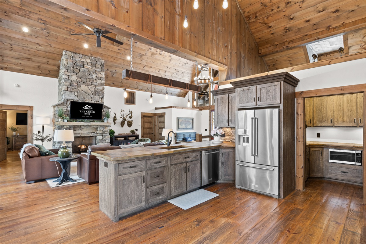 The open-concept layout flows seamlessly, connecting the kitchen, dining, and living areas for effortless gatherings.