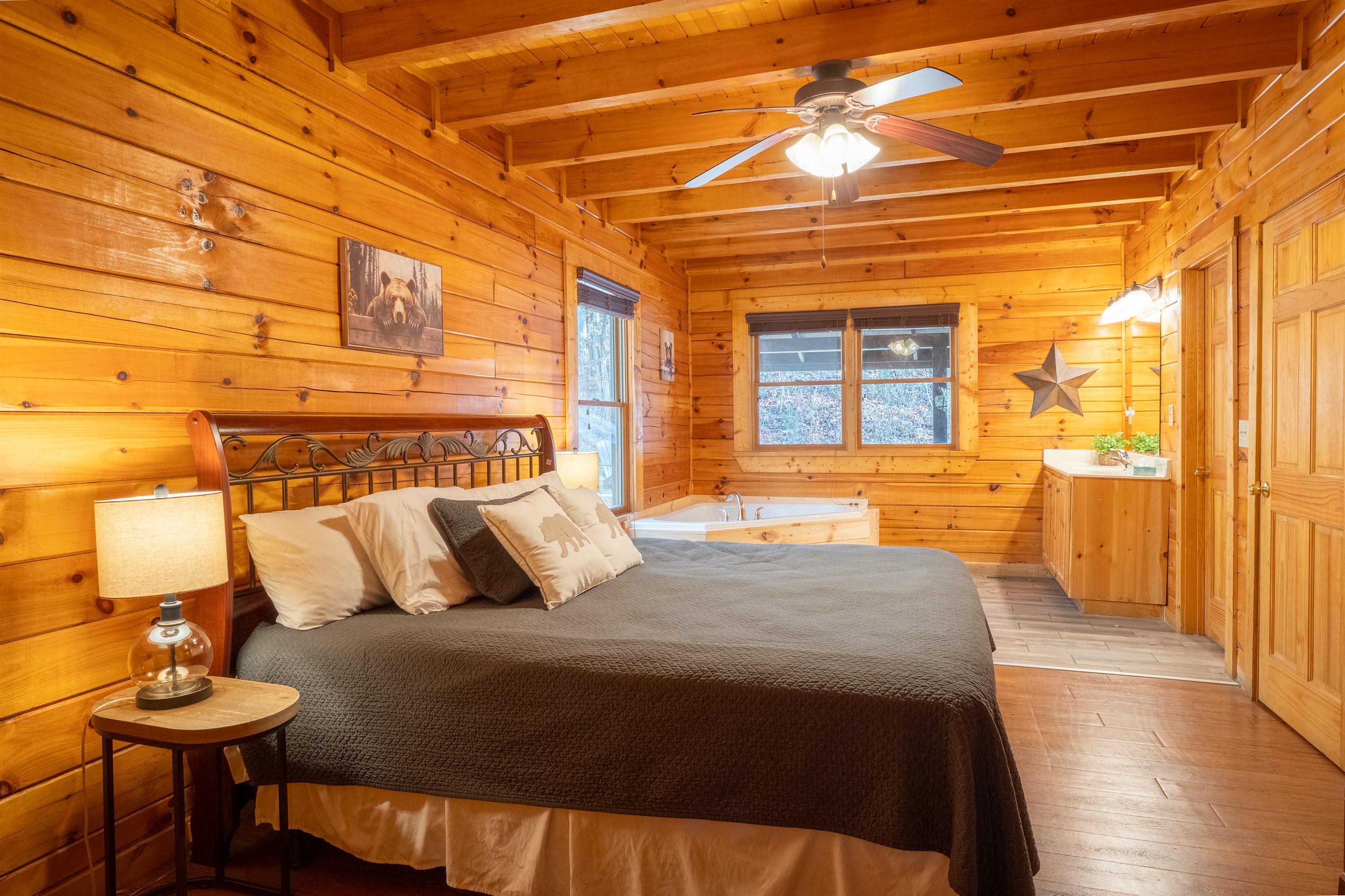 Our main floor master bedroom also has a comfy king bed and relaxing jacuzzi tub.