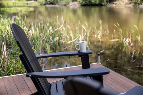 Enjoy a cup of coffee out on the dock at sunrise.