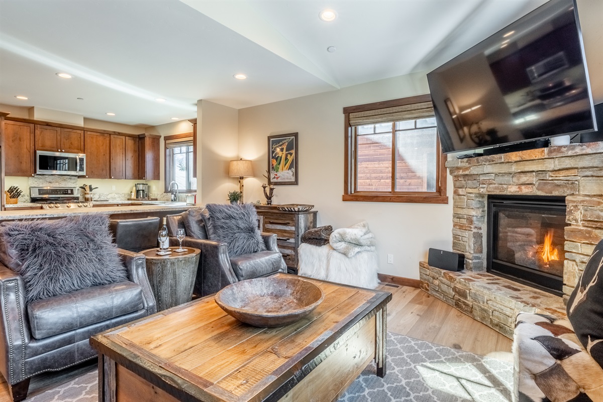The open living space flows naturally into the kitchen and dining area—making it easy for everyone to stay connected while relaxing or preparing meals.