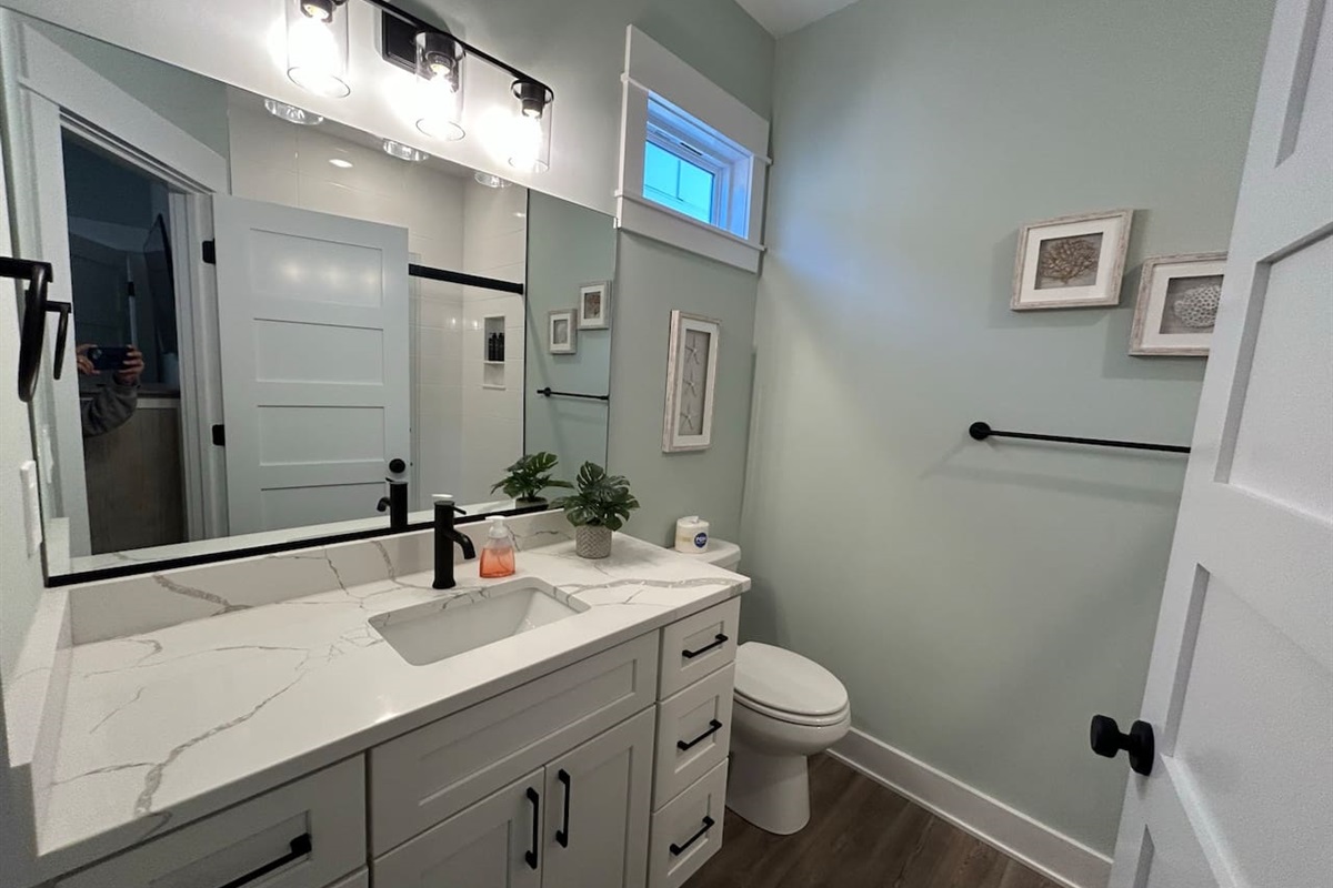Master bathroom with plenty of cabinet space.