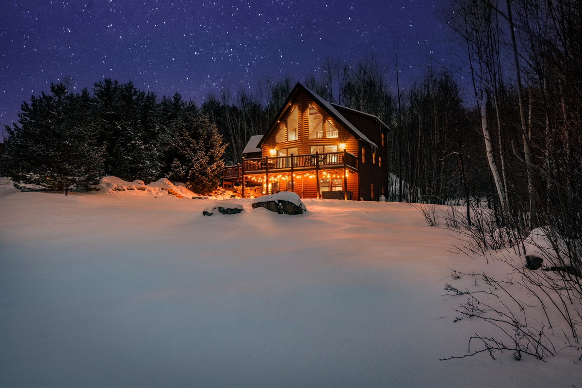 Experience understated luxury as the home comes alive at night.