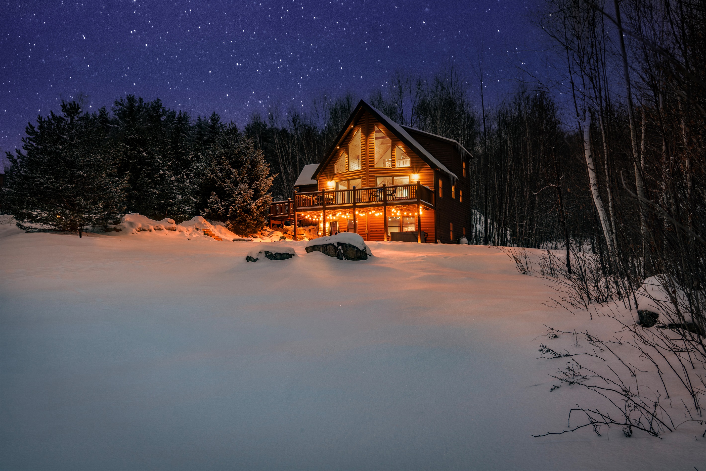 Experience understated luxury as the home comes alive at night.