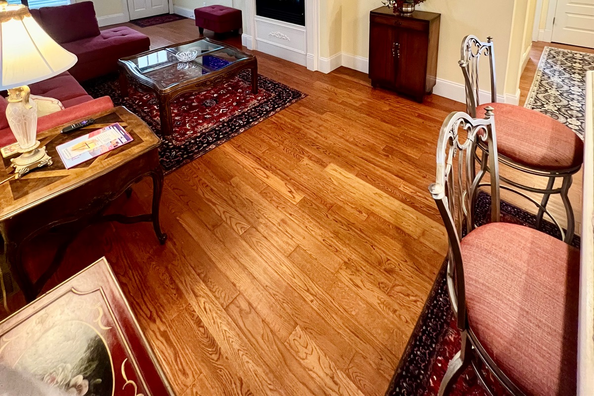 Relax and unwind in this cozy open-plan living room.