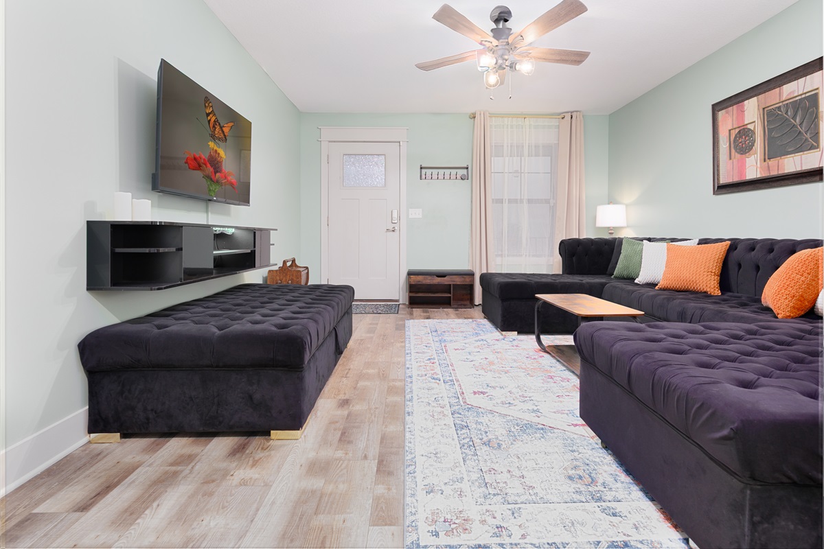 Comfortably furnished gathering space with ample seating for conversation, relaxation, or streaming your favorite shows.