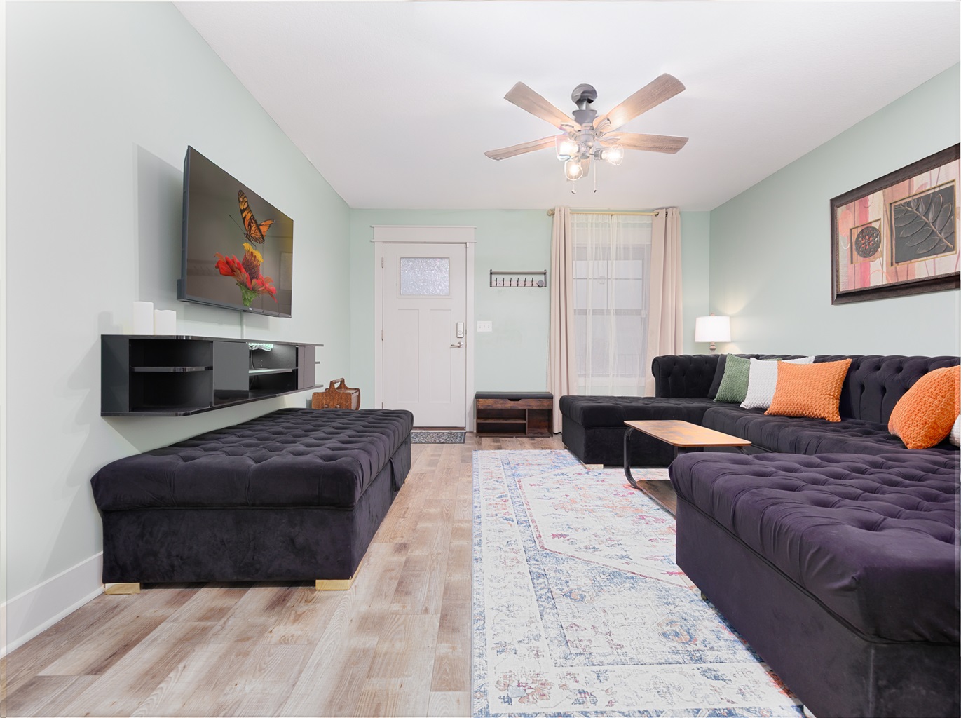 Comfortably furnished gathering space with ample seating for conversation, relaxation, or streaming your favorite shows.