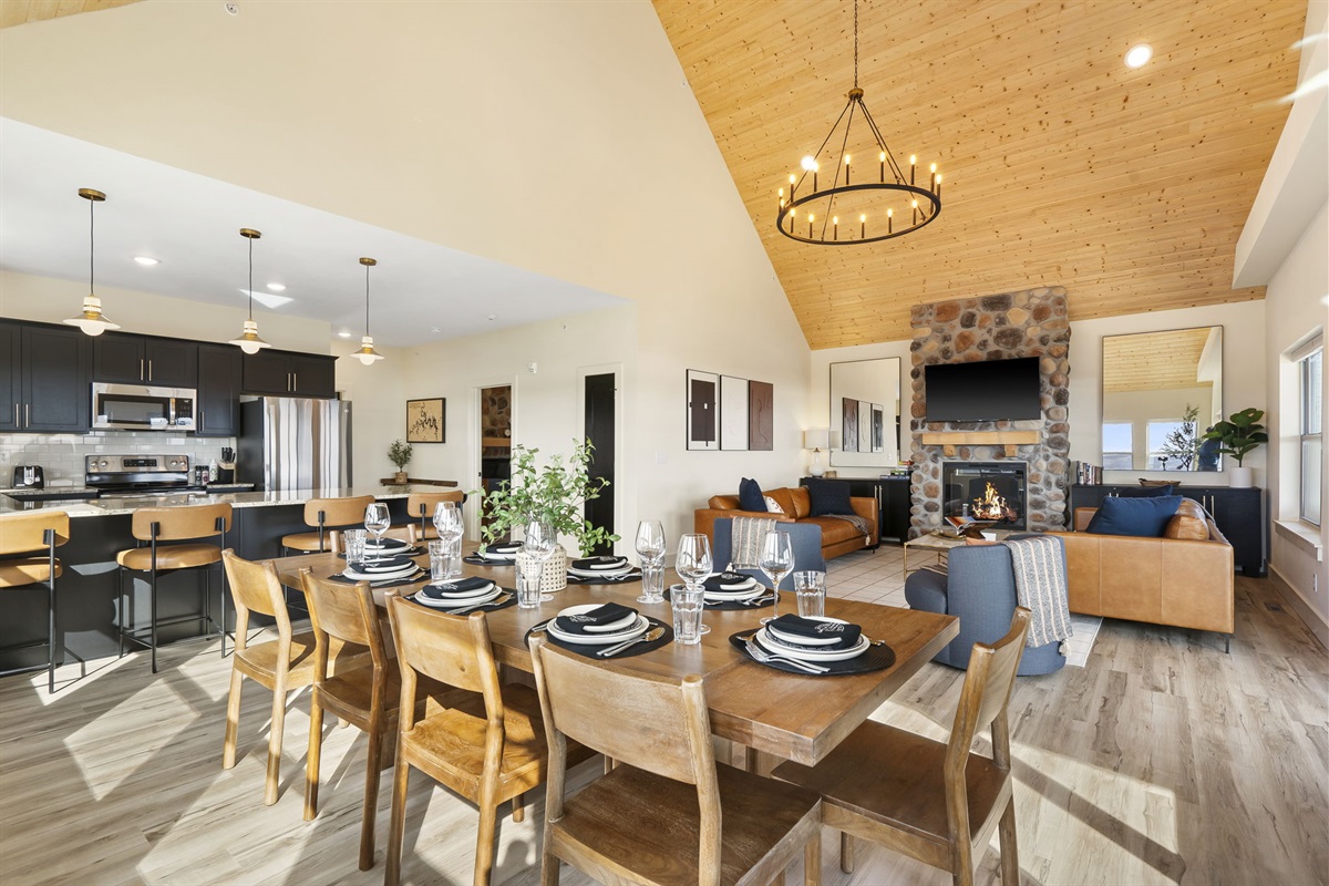 Main living spaces are on the upper floor of this home: Open kitchen with dining seating for the whole family!