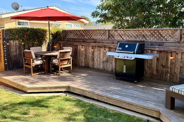 Backyard BBQ! Outdoor deck includes BBQ with tools, 2 chaise lounge chairs, a dining table with 4 chairs, and 2 camping rocker chairs (stored in garage).