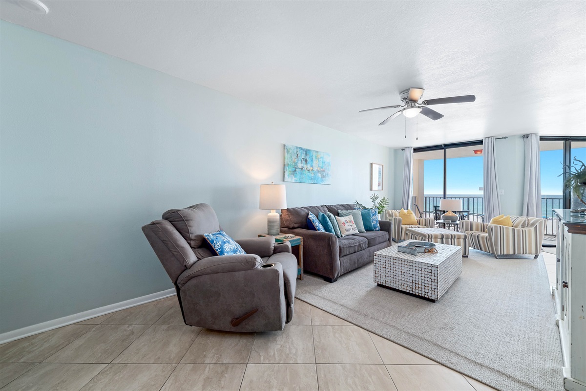 This comfortable living room offers ample seating, including a sleeper sofa for extra guests, and direct access to your private oceanfront balcony. Enjoy the stunning views from sunrise to sunset.