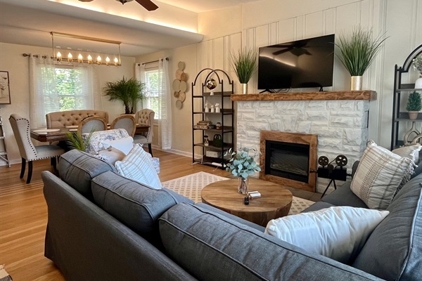Spacious living room with an electric fireplace