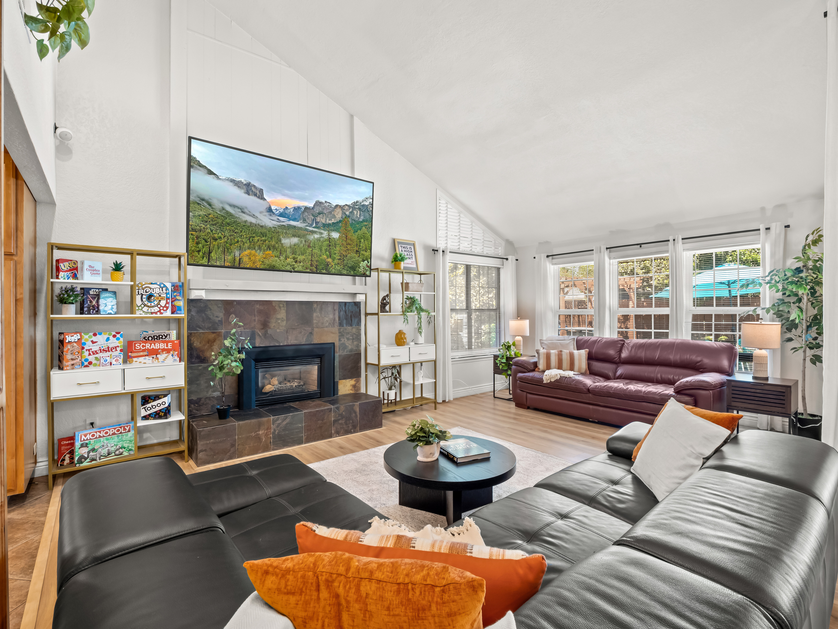 Make yourself comfortable in this bright and spacious living room, with plenty of seating for everyone to gather, relax, and enjoy time together.