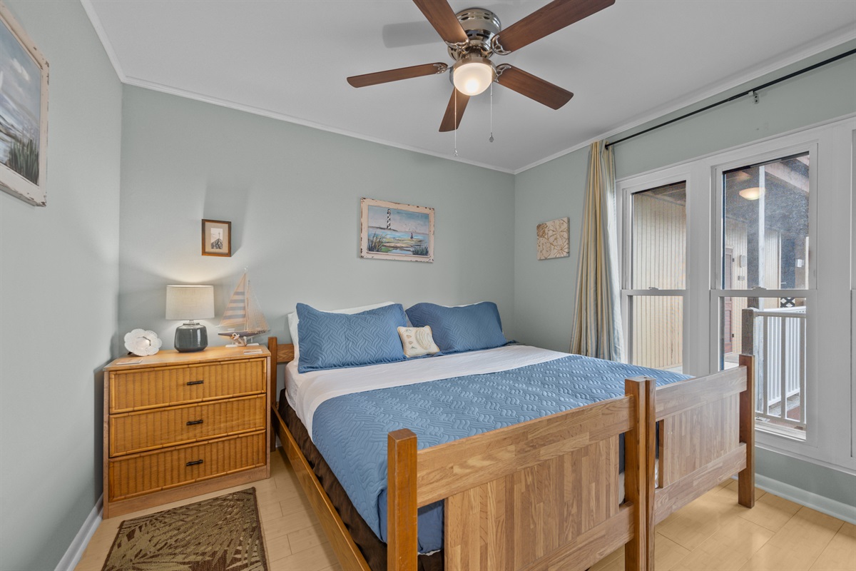 Front bedroom offers direct balcony access