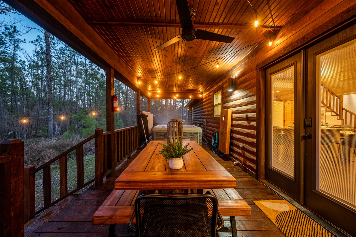 Dine al fresco in style at our charming veranda dining table - where every meal is served with a side of fresh air and scenic views