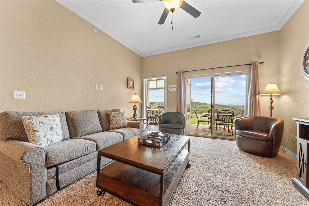 From movie night to quiet mornings, the living area stays bright and relaxed with the view just beyond.