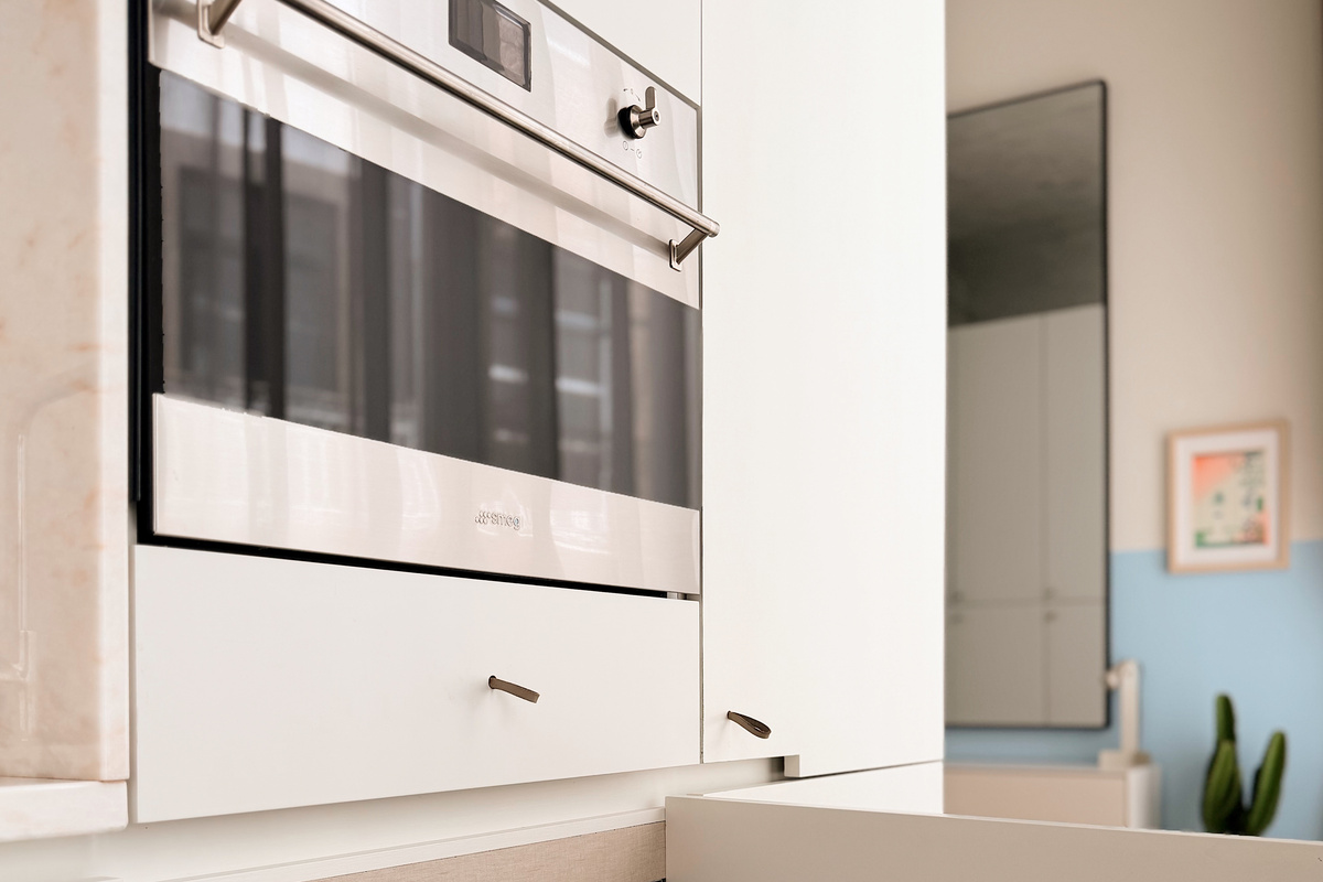 Washer/dryer hidden in the kitchen.
