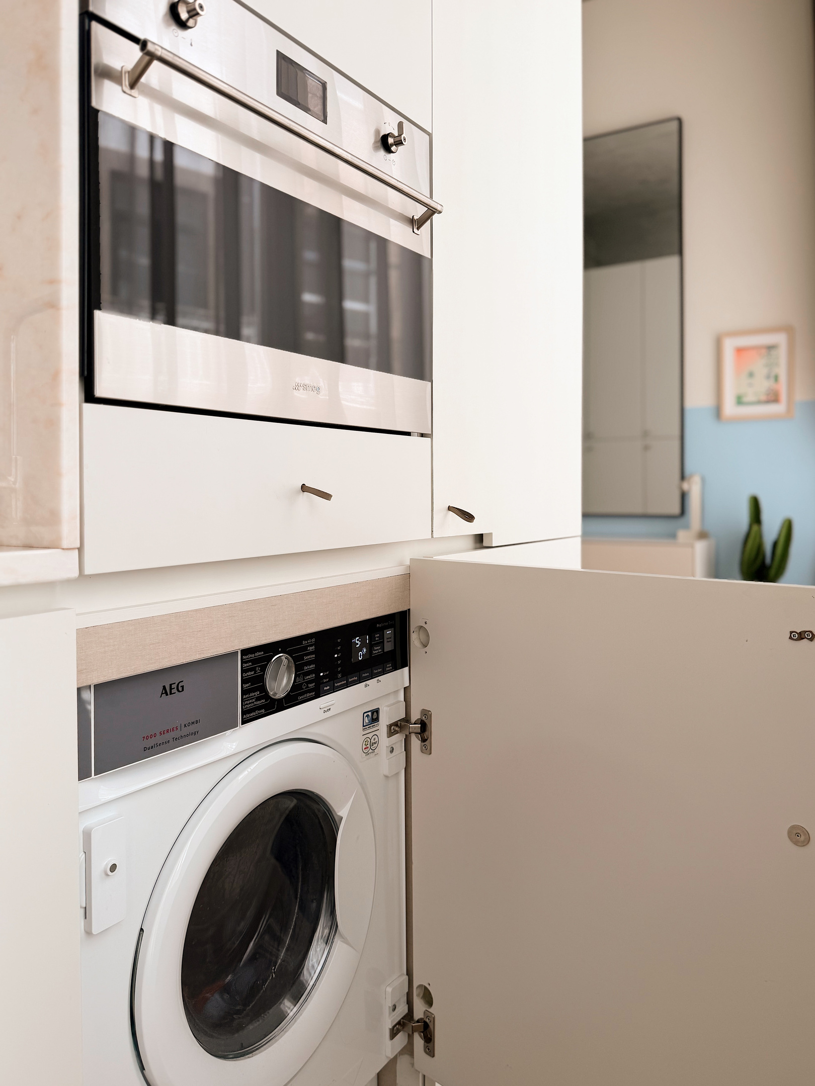 Washer/dryer hidden in the kitchen.