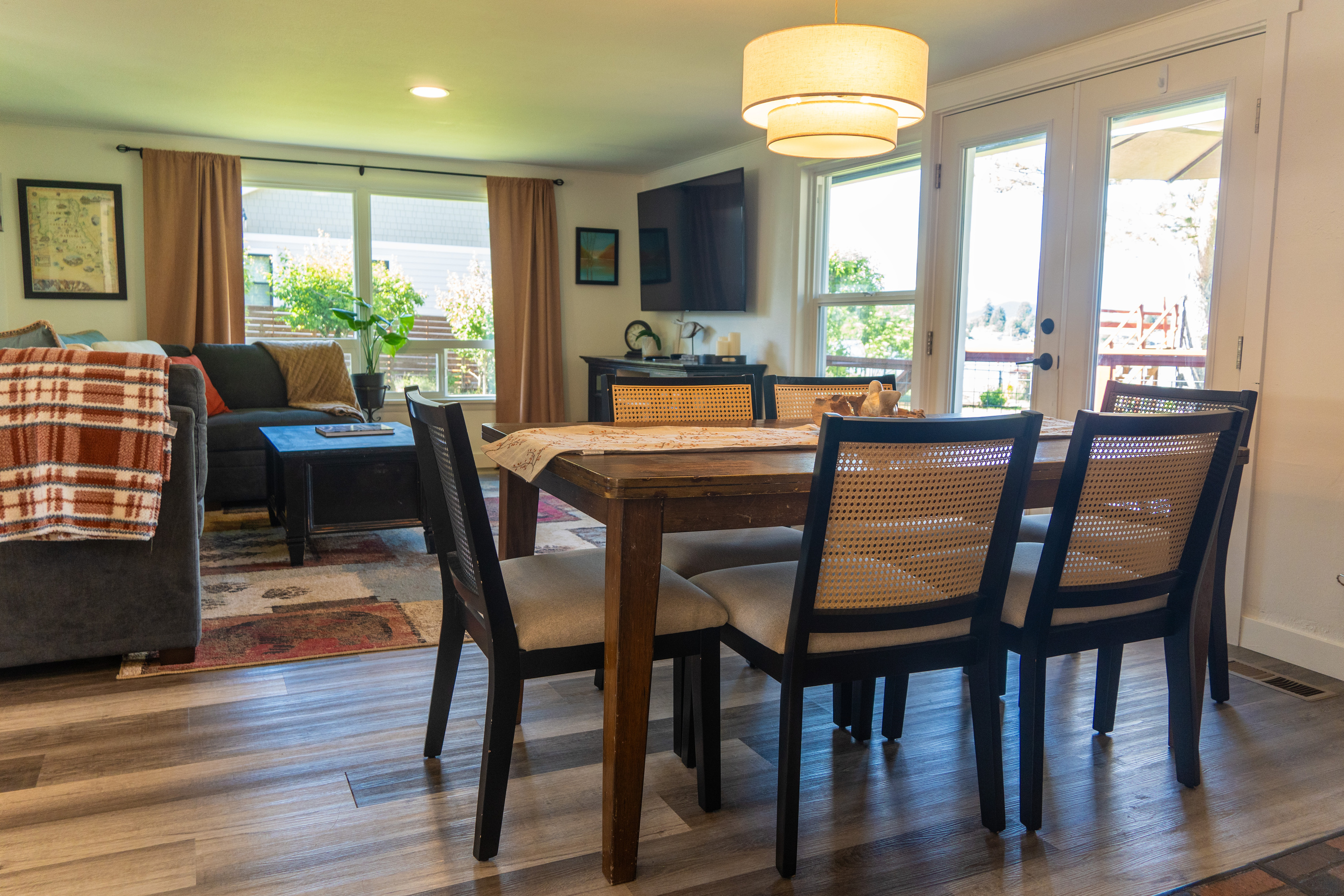 A table for six invites shared moments, where light and space come together to frame conversation and connection.