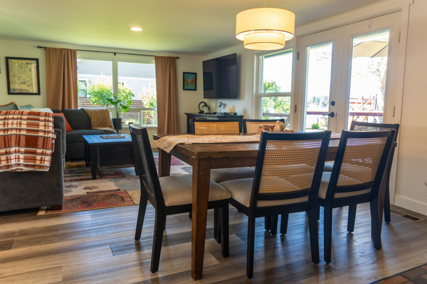 A table for six invites shared moments, where light and space come together to frame conversation and connection.