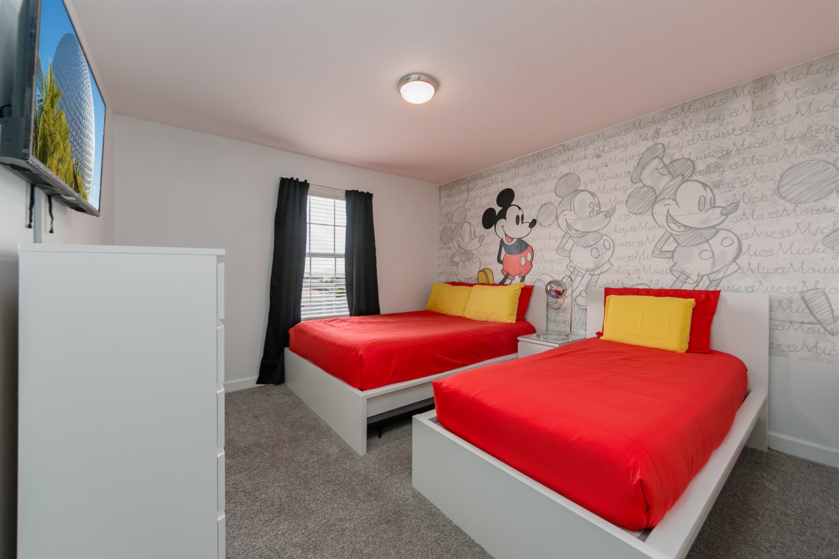 Mickey awaits at one of the kids bedrooms, with TV