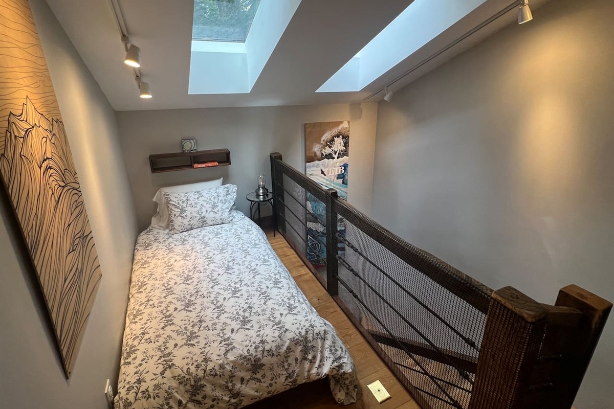 Twin bed loft at the top of Double Diamond with Double Barreled Star Gazer skylights