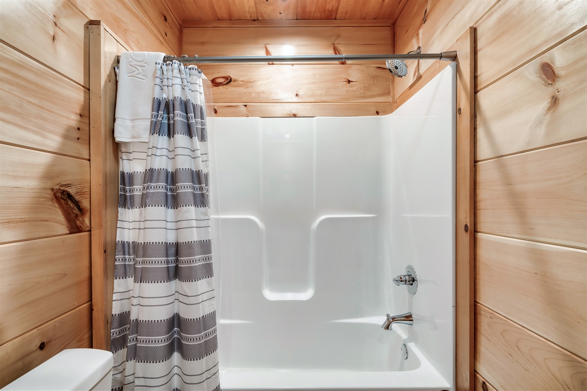 Bathroom with starter supplies and towels. 