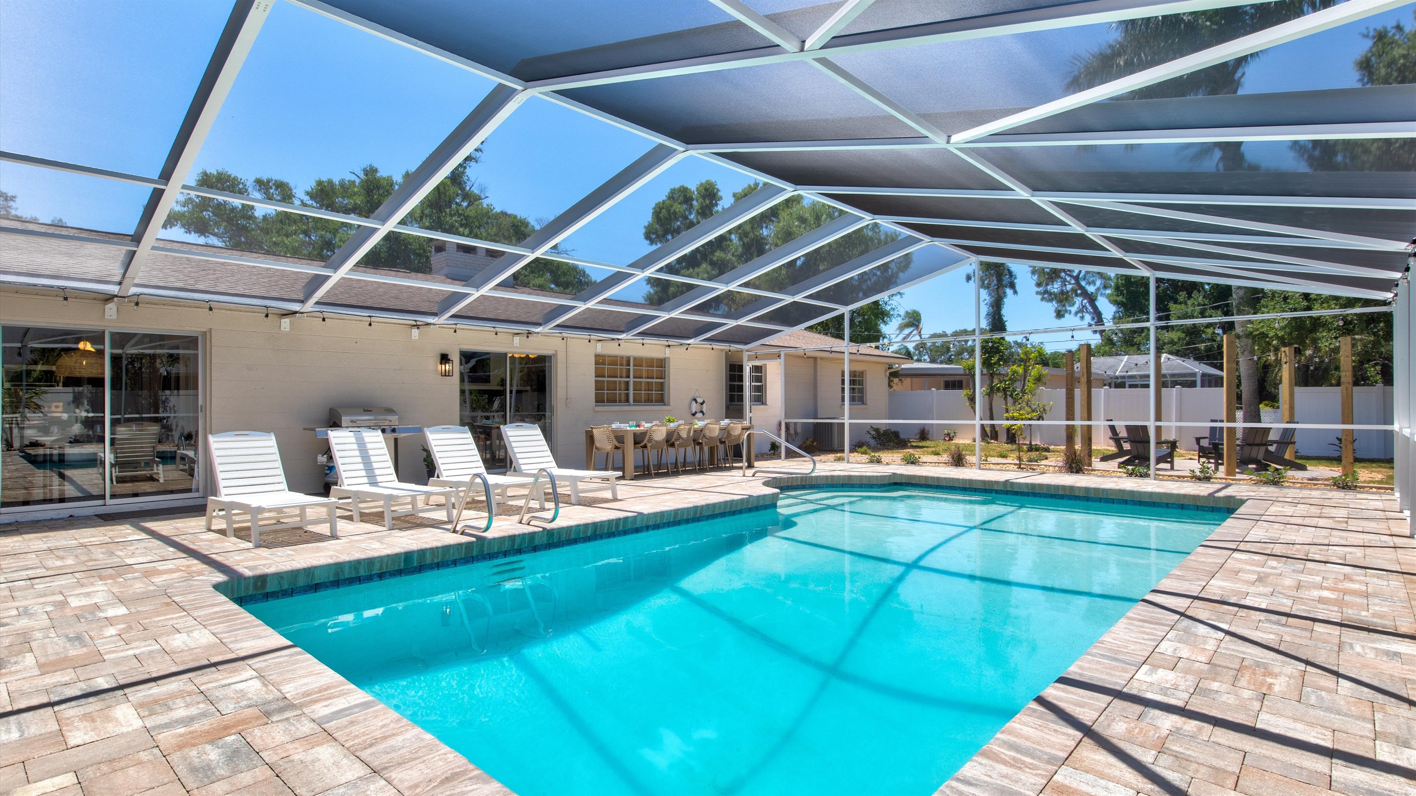 Discover Royal Eden! A serene oasis featuring a pristine pool surrounded by vibrant gardens and plush loungers designed for pure relaxation.