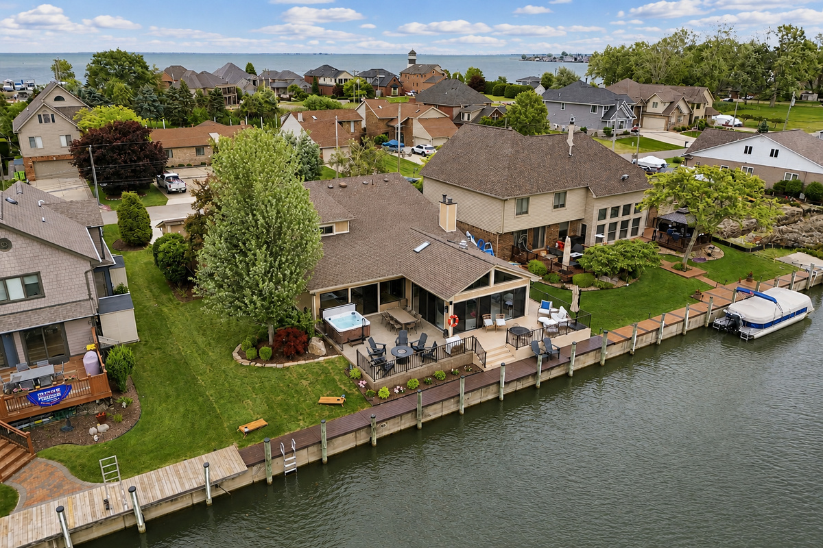 Waterfront luxury with private dock, hot tub, and outdoor seating—perfect for a relaxing getaway by the canal.
