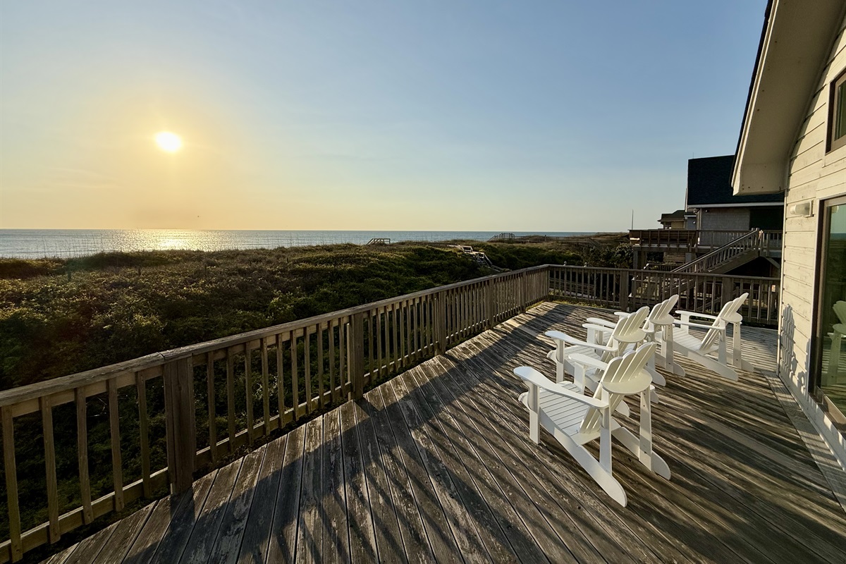 Watch the sunrise from the Adirondack chairs on the deck.