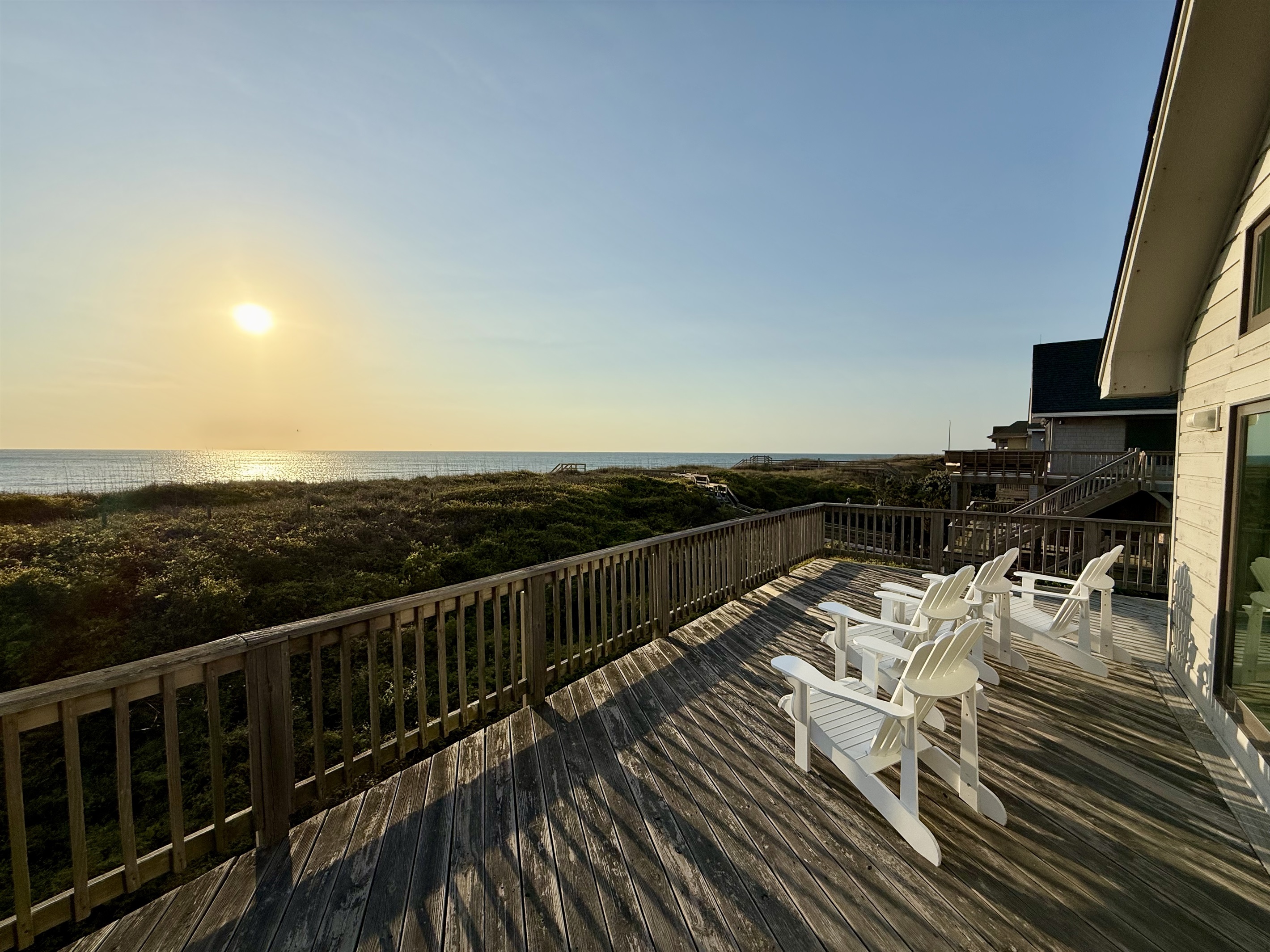 Watch the sunrise from the Adirondack chairs on the deck.