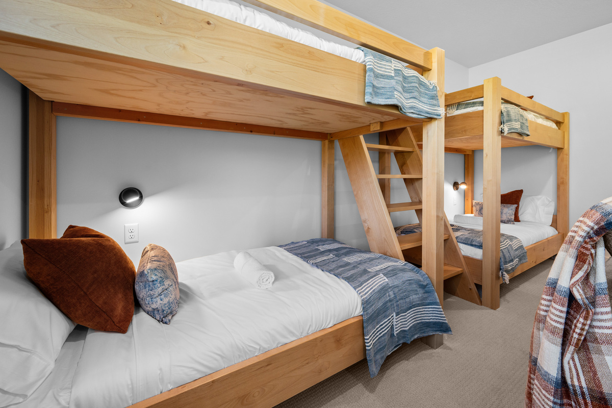 Twin-over-twin bunk beds offer comfortable sleeping.