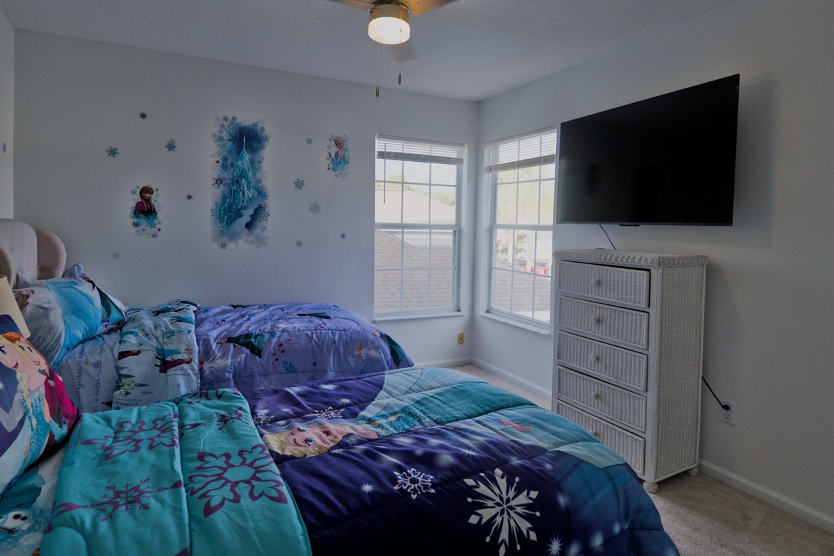 Frozen room with two twin beds.
