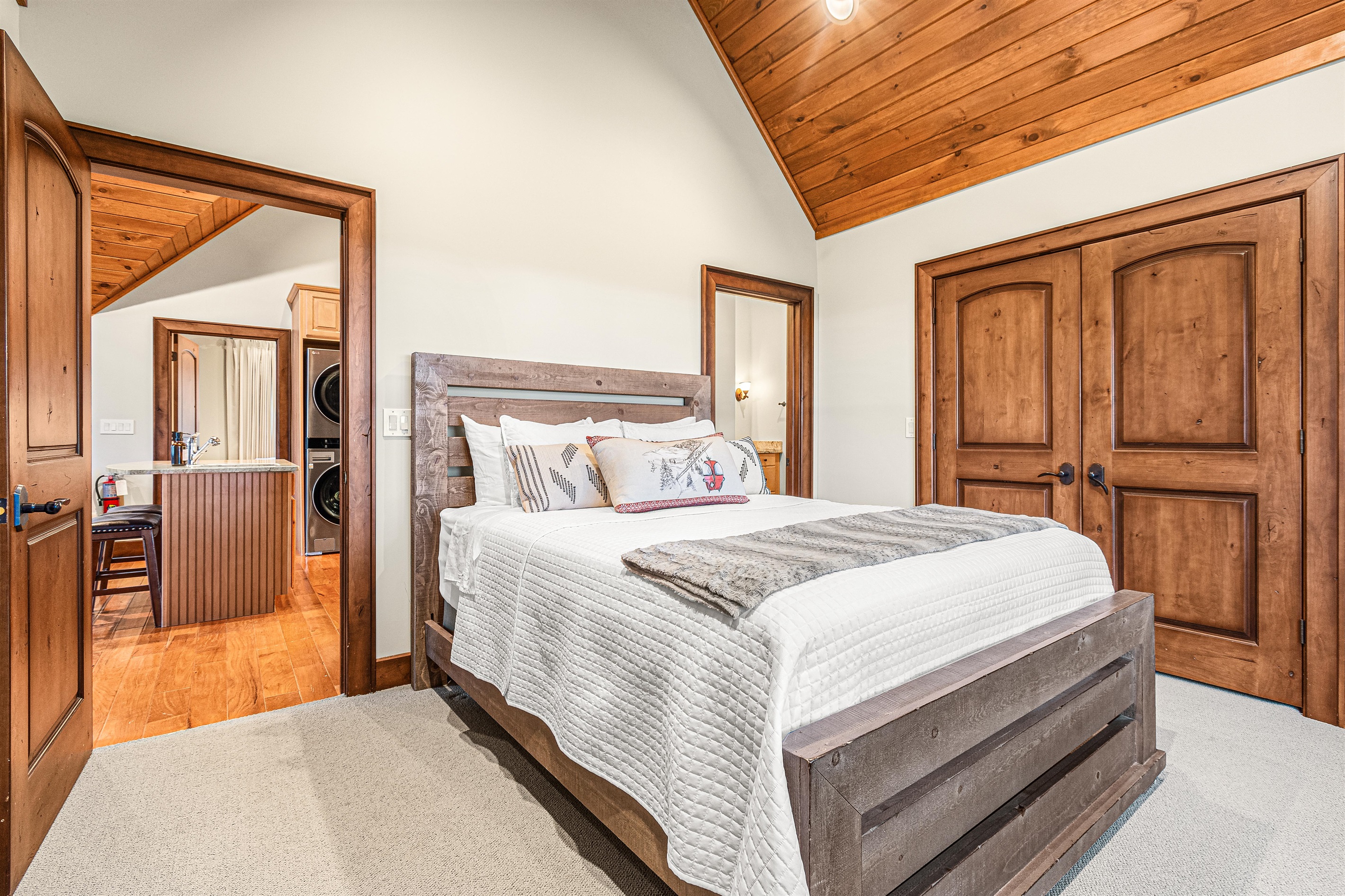 Guest House: Queen bedroom with ensuite and walk-in tiled shower.