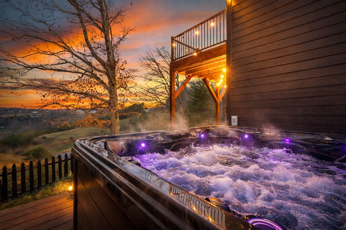 {Hot Tub Deck} Slip into the 6-person hot tub as the sky turns gold, jets bubbling while the mountains fade into dusk — the kind of evening that stretches longer than planned.