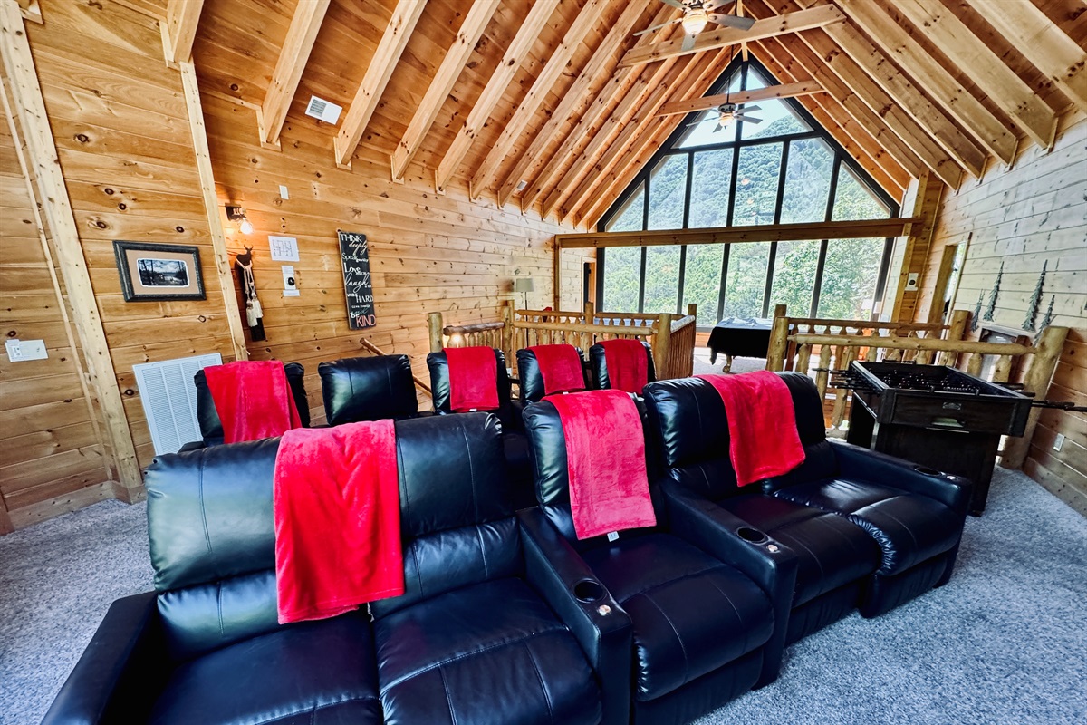 Dramatic soaring ceilings and theater seating for 10.